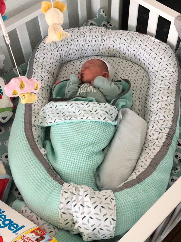 babynestje-mint-met-veertje