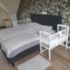 Tweeling houten co sleeper huren met NUNKI lakens